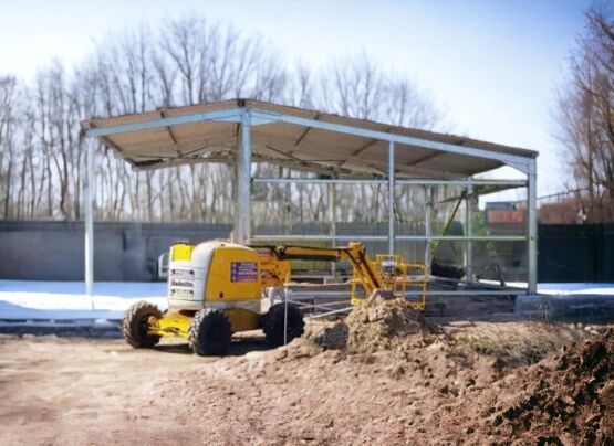 Bâtiment monopente galvanisé 216m² + auvent 3,5m - 12x18x5m - produit présenté par BATIMENTSMOINSCHERS.COM