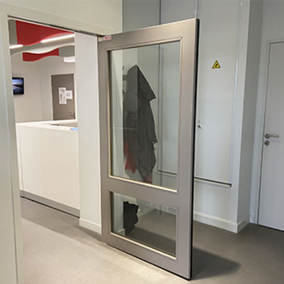 Bloc-porte coupe-feu EI 30 et EI 60 acoustique 50 dB sous tenture | Gamme Isophonique - produit présenté par CROUZILLES