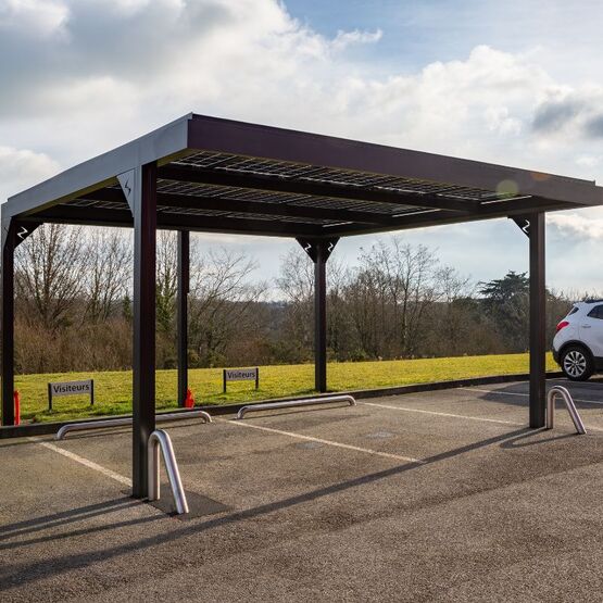 Carport photovoltaïque à raccordements cachés sur toiture monopente | Solcar System - produit présenté par SEPALUMIC