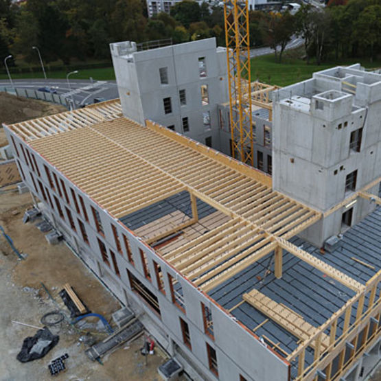 Façade mixte bois-béton | Procédé FMB - produit présenté par SBB