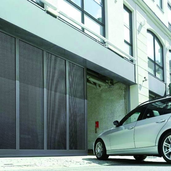 Porte coulissante pour garages à encombrement minimal | ST 500