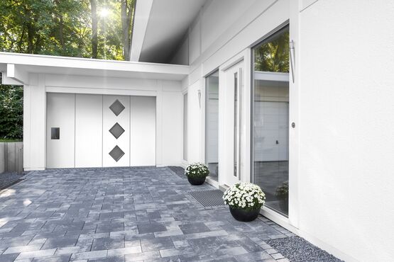 Porte de garage sectionnelle sur mesure à ouverture latérale | CARSEC PRO Latérale - produit présenté par SOPROFEN