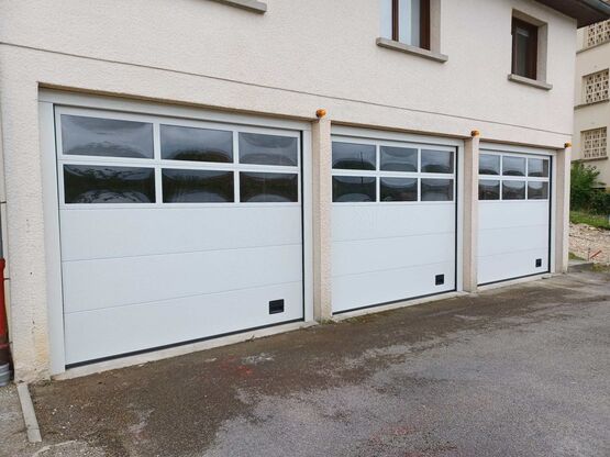  Porte sectionnelle à panneaux isolés et résistants au vent | I-14P Panel - DYNACO EUROPE