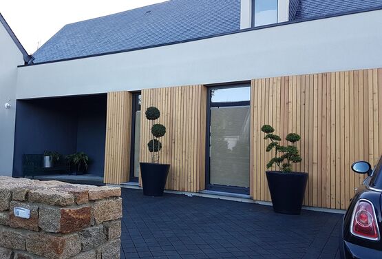  Revêtement bois naturel pour façades | Bardage en mélèze  - DINEGO SARL