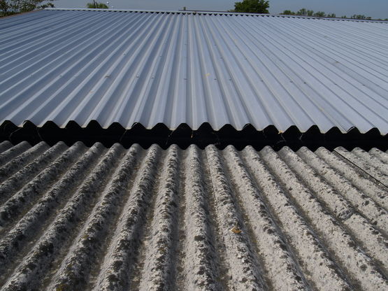  Sur-toiture pour réhabilitation de couvertures en fibrociment | Fibrall - Panneaux aspect tuiles ou ardoises