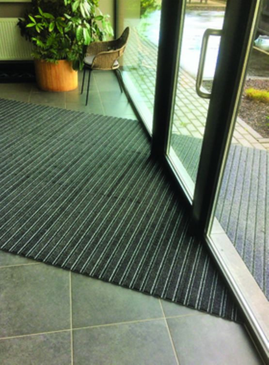  Tapis d&#039;entrée sous forme de lames | Quickmat-Tile - Tapis d'accueil et de propreté