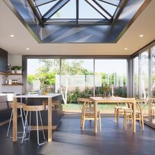 Véranda aluminium brevetée à ossature bois et toiture plate pour extension d'habitat | Espace²Vie