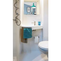 Salle de bain préfabriquée aux lignes courbes | JADE | Gamme BAUDET INTIAL