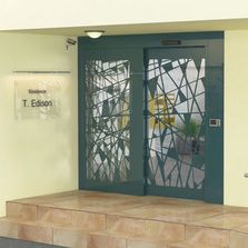 Porte coulissante motorisée pour hall d'entrée | Portech