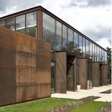 Finition effet rouille pour menuiseries et murs rideaux du fabricant | Rouille natif