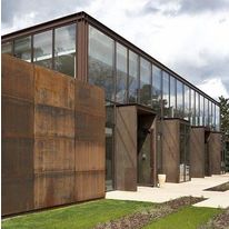 Finition effet rouille pour menuiseries et murs rideaux du fabricant | Rouille natif