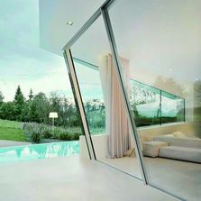 Baie coulissante inclinée en aluminium | Sky-Frame Slope