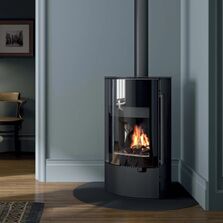 Poêle à bois ovale acier noir porte vitrée 8 kW | LARY 	
