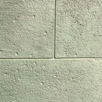 Béton banché et matricé aspect pierre de Bordeaux en façade | Decovoil Burdigalal