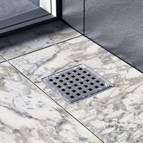 Caniveau pour douche à l'italienne avec grille inox et sortie à 360° | CANIVEAUX DE DOUCHE A L’ITALIENNE