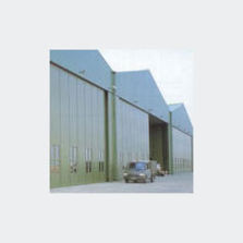 Porte roulante à rangement accordéon ou tournant et à manœuvre manuelle ou électrique | Porte roulante accordéon