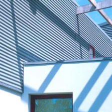 Bardage ondulé en zinc pour façades planes ou cintrées | VMZ Profil sinus