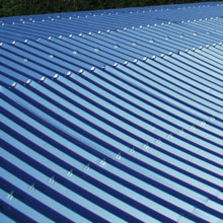 Toiture en tôle d'aluminium nervurée