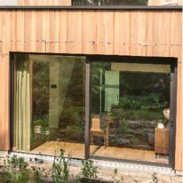 Portes coulissantes bois-aluminium | PIERRET SA 