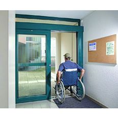 Porte coulissante motorisée pour hall d'immeuble | Portadapte