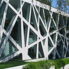Mur rideau à structure aluminium dissimulée sous vitrage | CW 50-SC