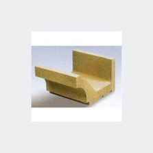 Gamme de corniches creuses en béton d'aspect pierre