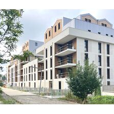 Brique minérale de parement pour ossature bois 