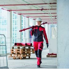 Vêtement de travail à coupe ajustée pour femme | Mewa Dynamics