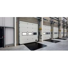 Porte sectionnelle industrielle isolée | Panneaux acier double paroi avec mousse polyuréthane