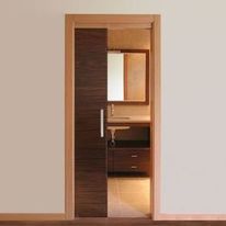 Système coulissant droit motorisé pour portes en bois | WIDOOR 