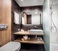 Découvrez le dernier projet phare de BAUDET SA : 90 salles de bain « prêtes à poser » spécialement créées pour un hôtel haut de gamme « Les Jardins de l’Olympie » à Antibes !