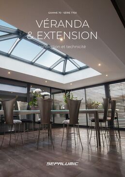 Véranda aluminium brevetée à ossature bois et toiture plate pour extension d'habitat | Espace²Vie