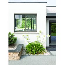 Menuiserie en aluminium à profilés fins et battement central mince | Battement Mince