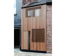 Porte en bardage vertical à claire-voie pour maison ossature bois | Open Nature
