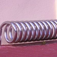 Range-vélos en hélice | Omega