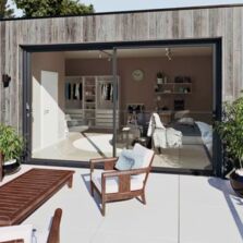 Baie coulissante motorisée à montant central ultrafin | SLINOVA