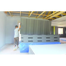 Panneau isolant en deux parties emboîtant le passage de gaines | Placomur DuoPass