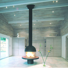 Cheminée centrale à vitrage panoramique coulissant | 83-123