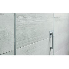 Porte d'entrée pivotante à axe excentré et habillage béton | Synua Armatura