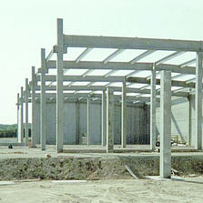 Structure en béton précontraint pour bâtiments industriels | Système Dolmen
