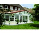 Véranda à ossature bois et menuiserie aluminium | Veyra