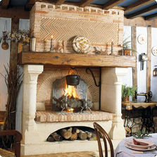 Cheminée à double foyer avec hotte en briques claires | Villiers