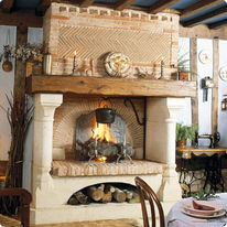 Cheminée à double foyer avec hotte en briques claires | Villiers