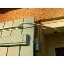 Motorisation pour volets battants à bras coulissant ajustable | Pratic Volet