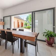 Baie vitrée double coulissant mural à double refoulement sur les murs | Double coulissant mural M3DS 